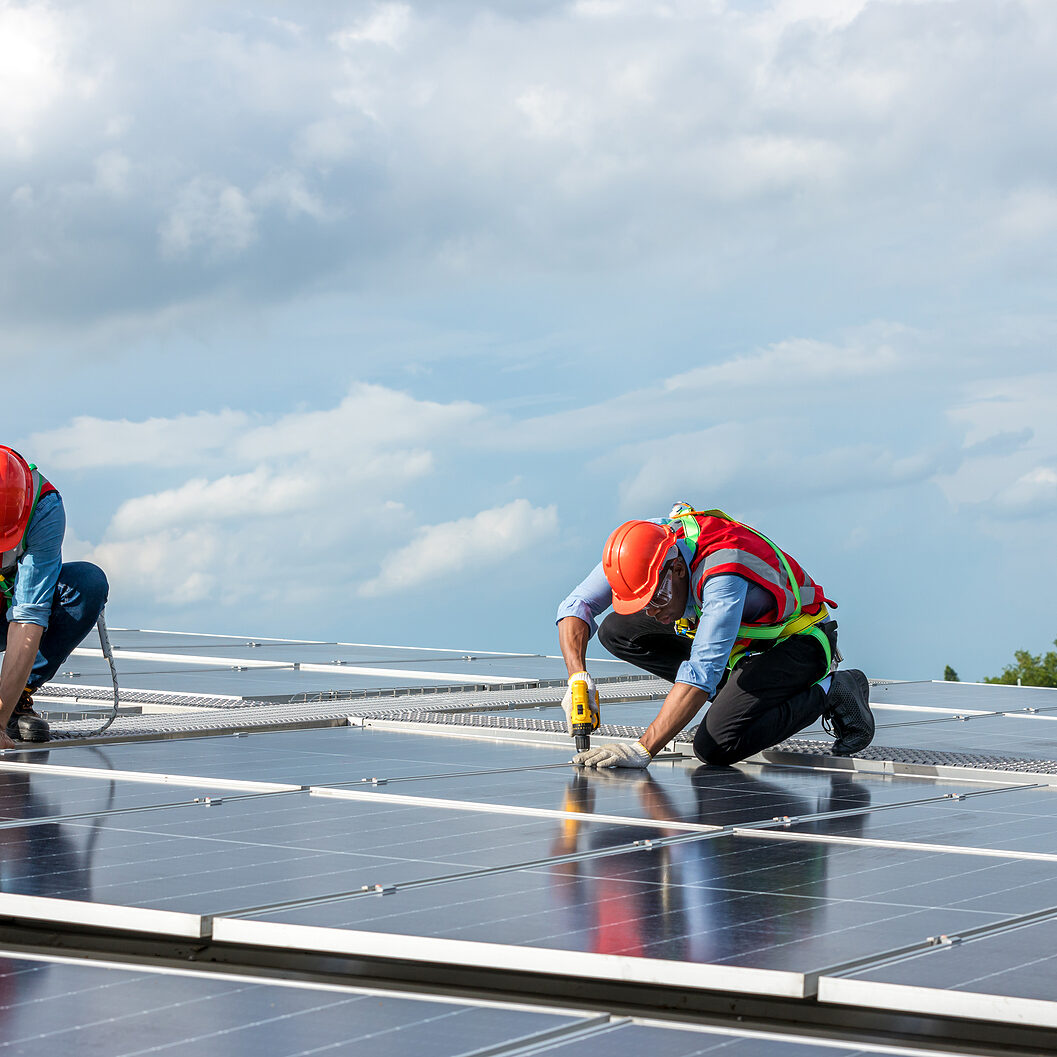 Engineer Working Setup Solar Panel At The Roof Top. Engineer Or SOLAR & ENERGY MANGEMENT